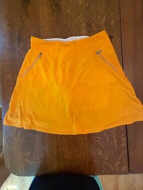 NWT Tail Golf Skort Marigold Orange Pull-On Performance Skort Size Small UPF 50+